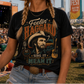 Woman at ACL Fest wearing a 'Feelin' Haggard' t-shirt with a stage and crowd in the background.